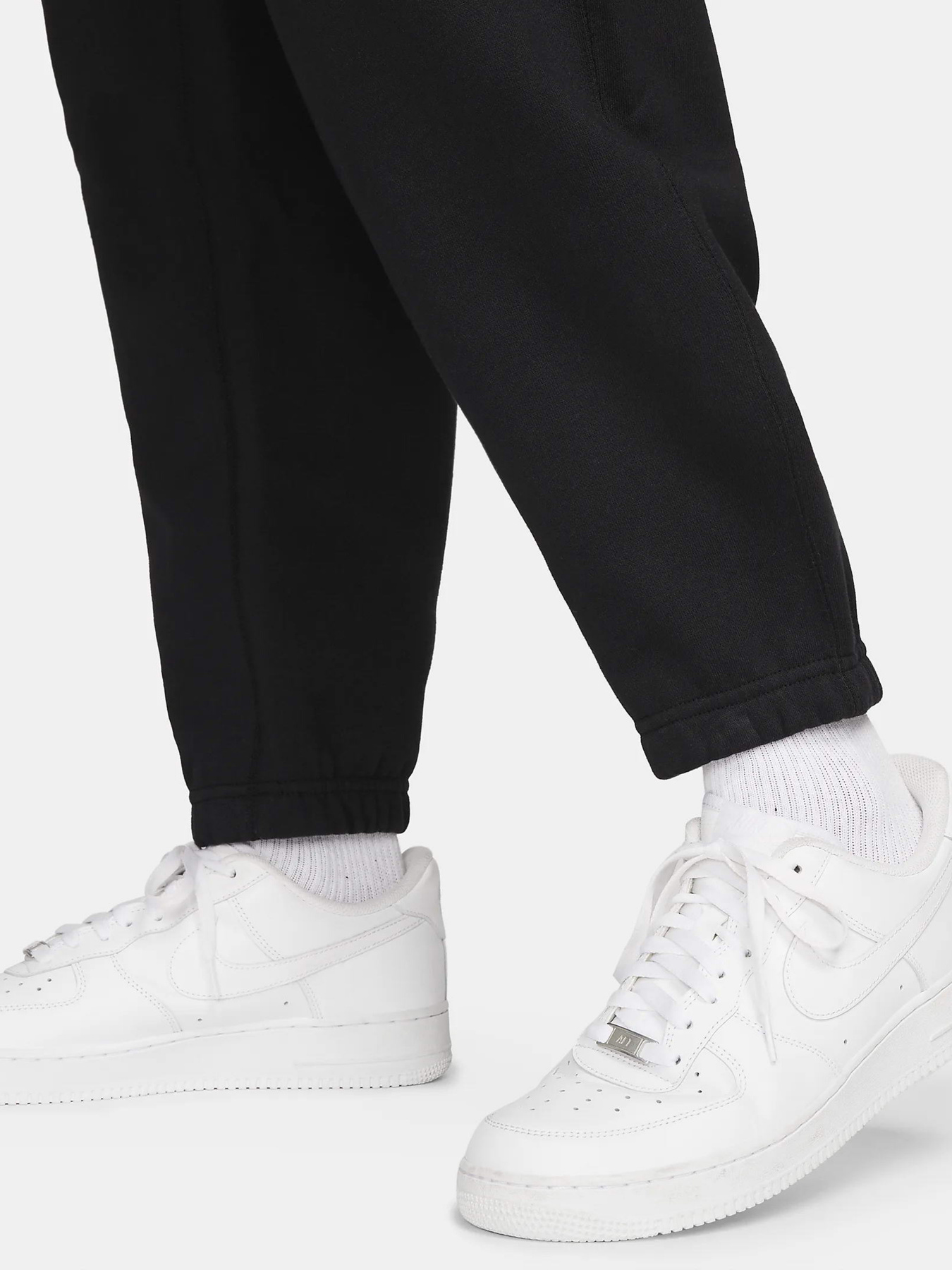 Брюки NIKE Solo Swoosh Fleece модель DX1364-010 Фото