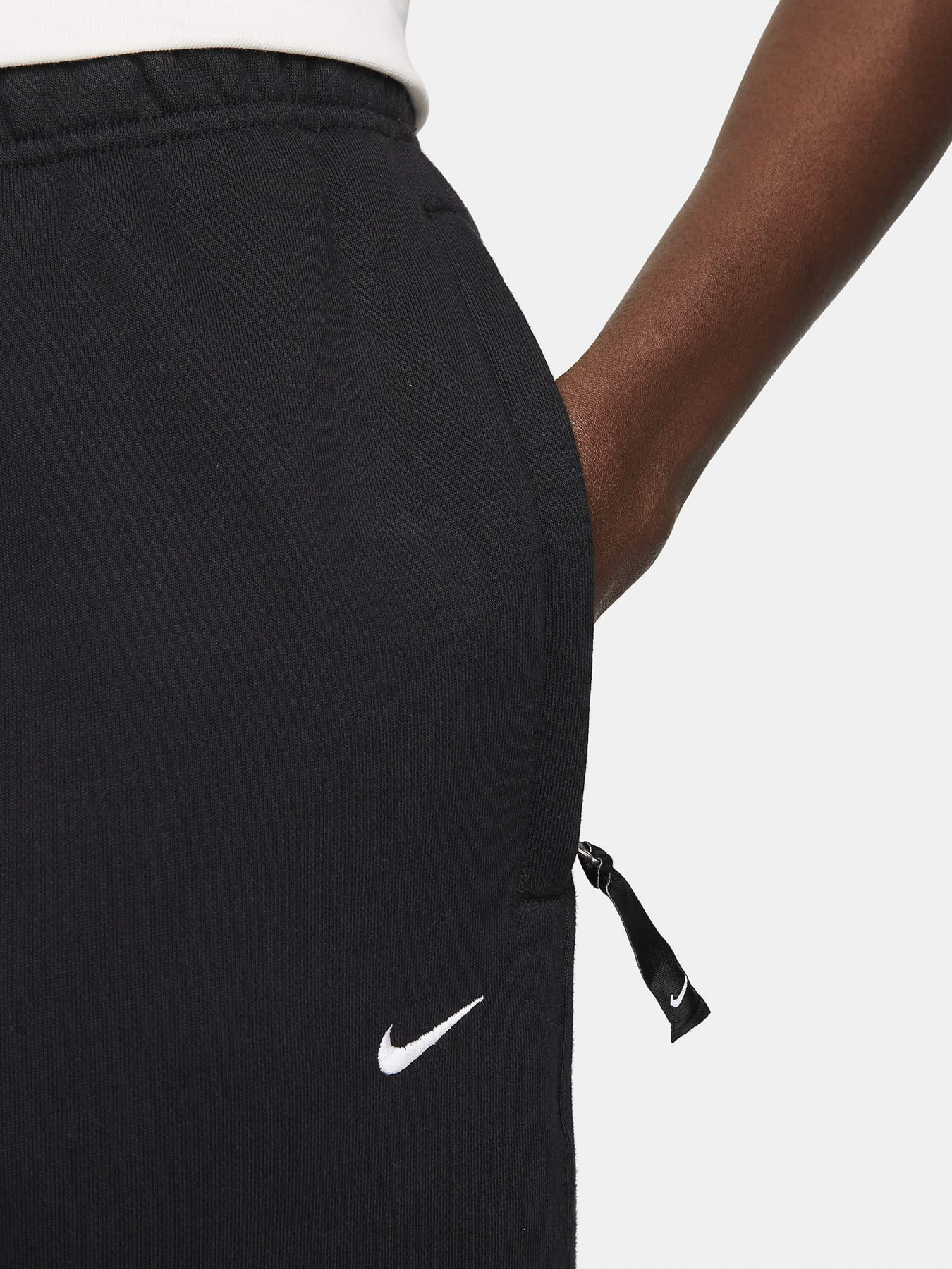 Брюки NIKE Solo Swoosh Fleece модель DX1364-010 Фото