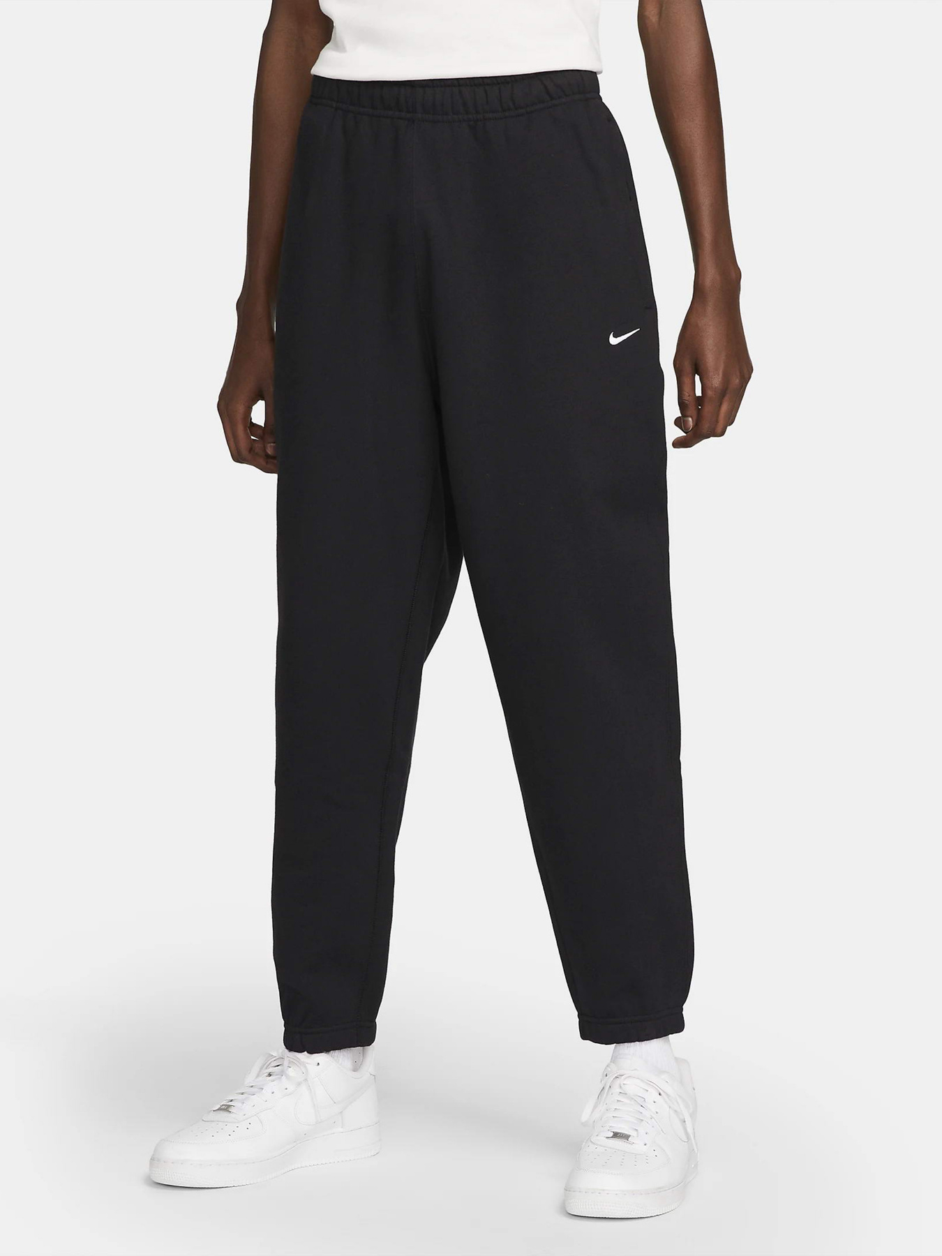 Брюки NIKE Solo Swoosh Fleece модель DX1364-010 Фото