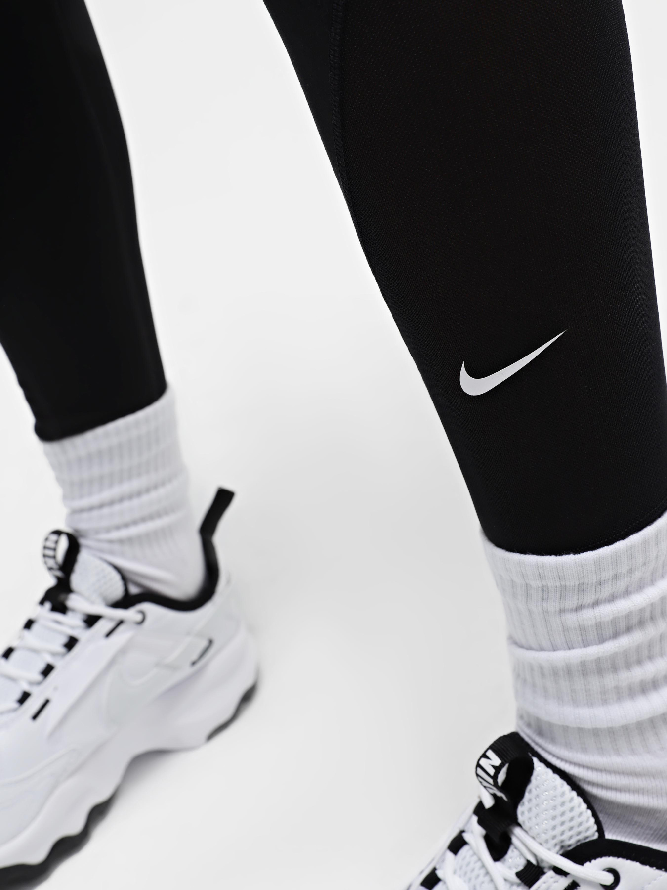 Брюки NIKE ONE HIGH-WAISTED 7/8 модель DV9020-010 Брюки NIKE ONE HIGH-WAISTED 7/8 модель DV9020-010 Фото