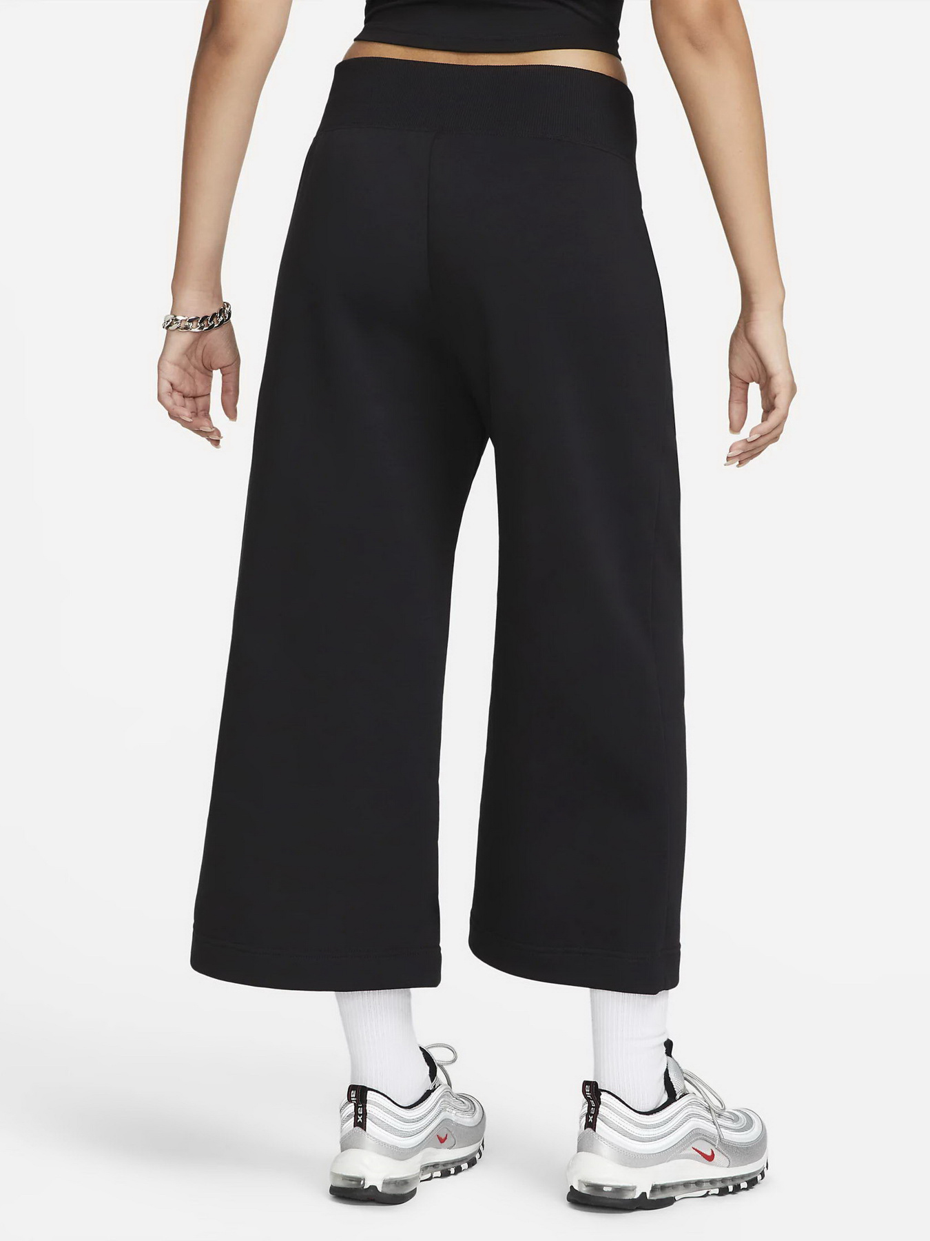 Брюки NIKE PHNX FLC HR CROP SWTP модель FB8313-010 Брюки NIKE PHNX FLC HR CROP SWTP модель FB8313-010 Фото