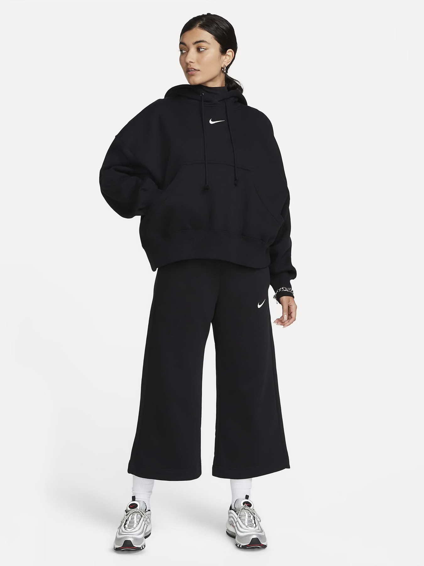 Брюки NIKE PHNX FLC HR CROP SWTP модель FB8313-010 Брюки NIKE PHNX FLC HR CROP SWTP модель FB8313-010 Фото