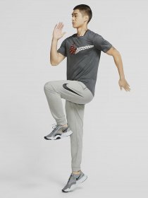 Брюки NIKE Dri-FIT модель CU6775-063 Фото
