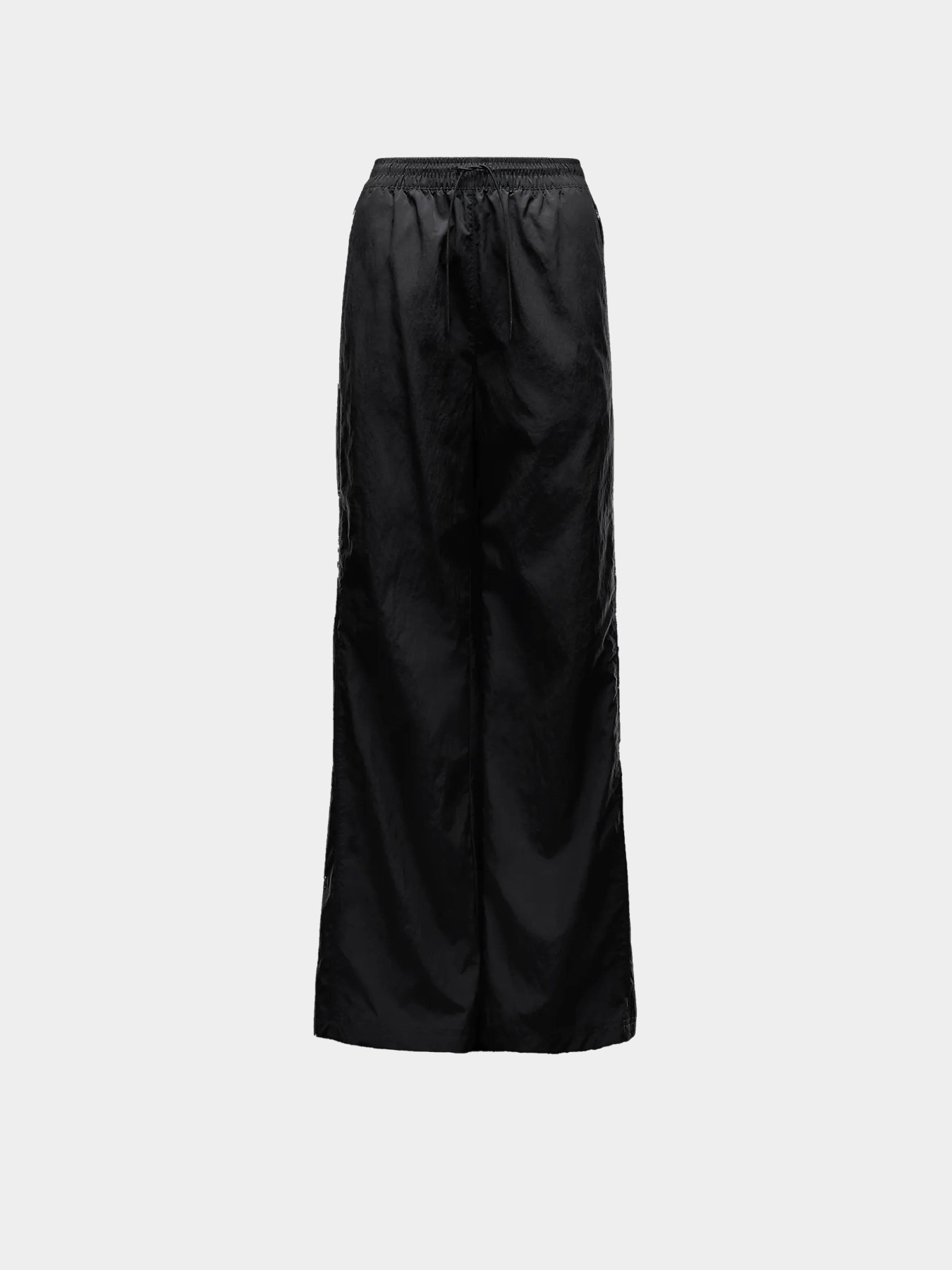 Брюки NIKE WINDRUNNER модель FV7655-010 Фото