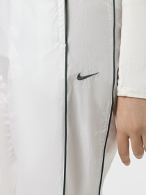Брюки NIKE WINDRUNNER модель FV7655-134 Фото