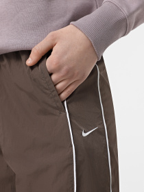 Брюки NIKE WINDRUNNER HIGH-WAISTEDVEN OPE модель FV7655-004 Фото