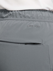 Штани NIKE DRI-FIT UNLIMITED TAPERED LEG модель FB7548-084 Фото