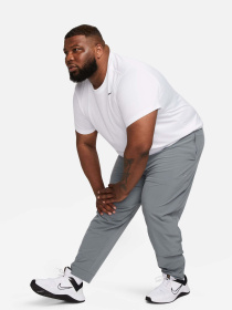 Штани NIKE DRI-FIT UNLIMITED TAPERED LEG модель FB7548-084 Фото