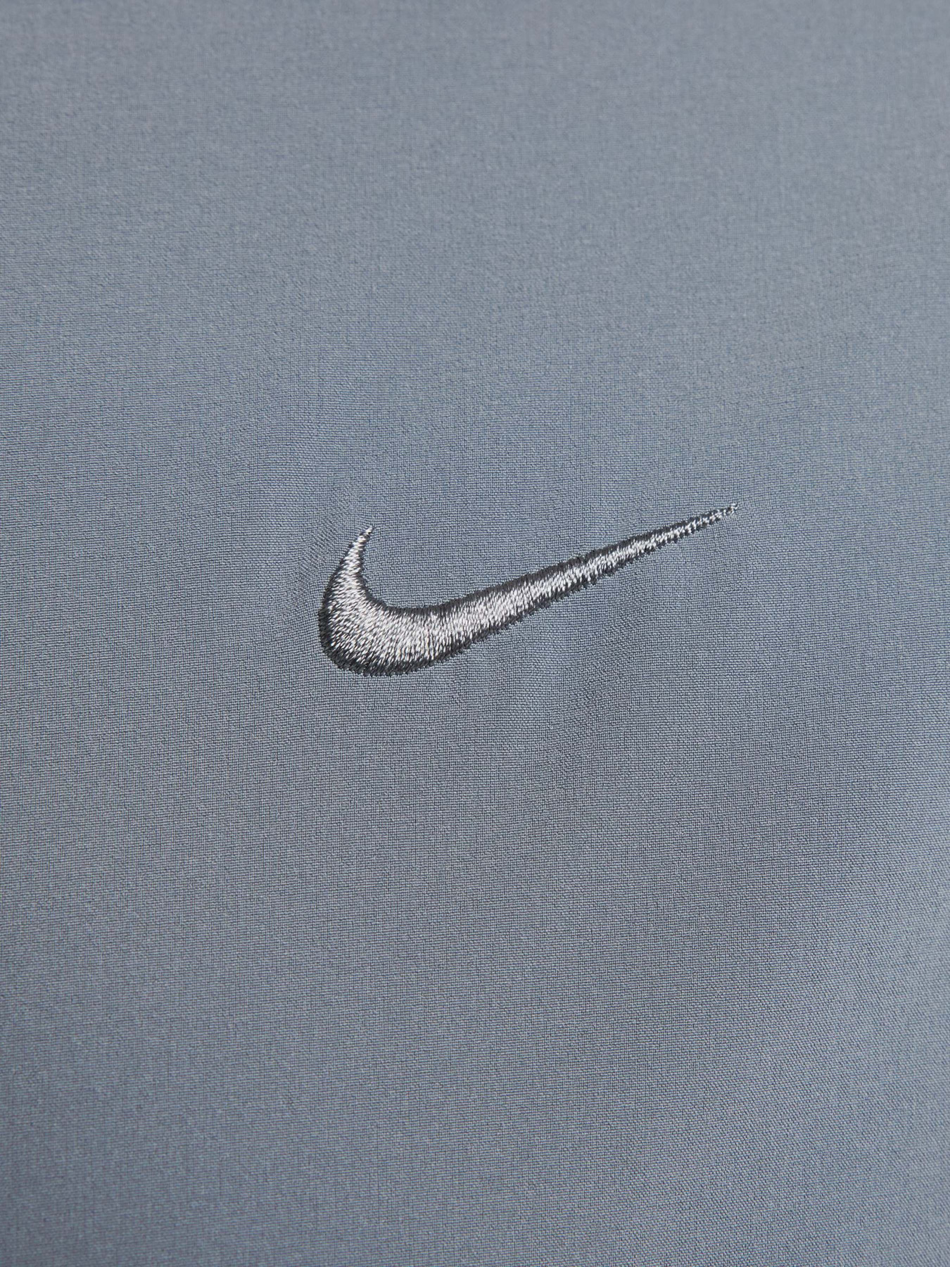 Куртки и дубленки NIKE UNLIMITED WATER-REPELLENT HOOD модель FB7551-084 Фото