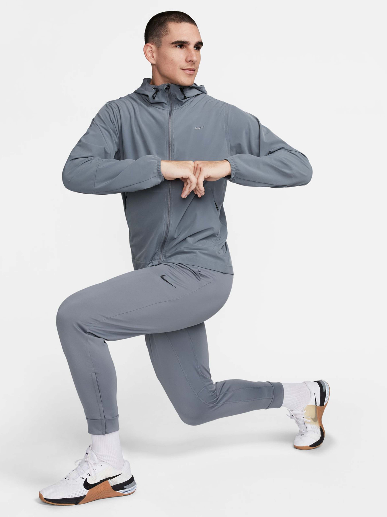 Куртки и дубленки NIKE UNLIMITED WATER-REPELLENT HOOD модель FB7551-084 Фото