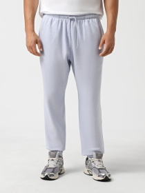 Брюки NIKE CLUB MEN'S CUFFED BRUSHED FLEE модель FN3808-057 Фото