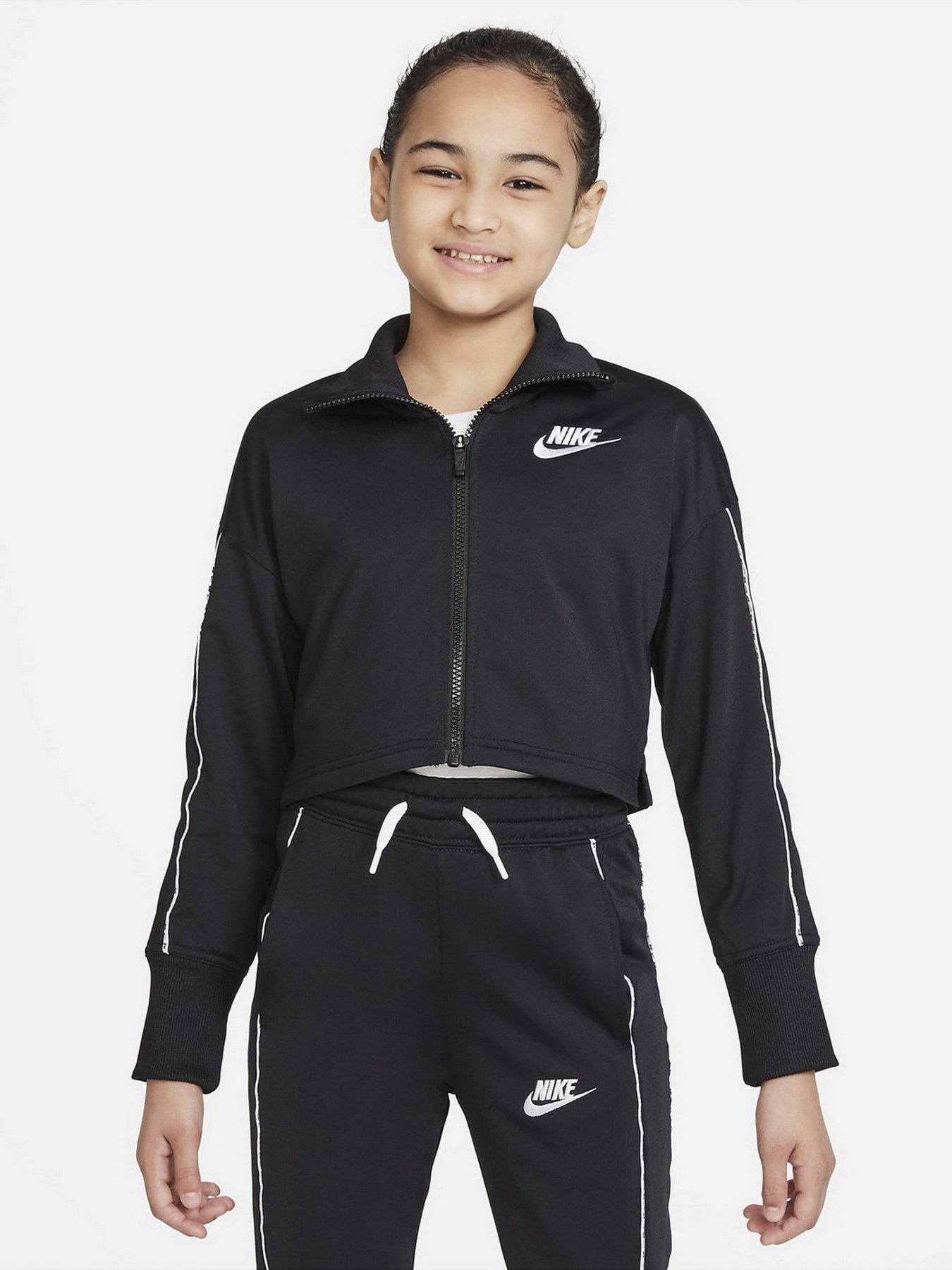 Костюмы NIKE G NSW TRK SUIT модель DD6302-010 Фото