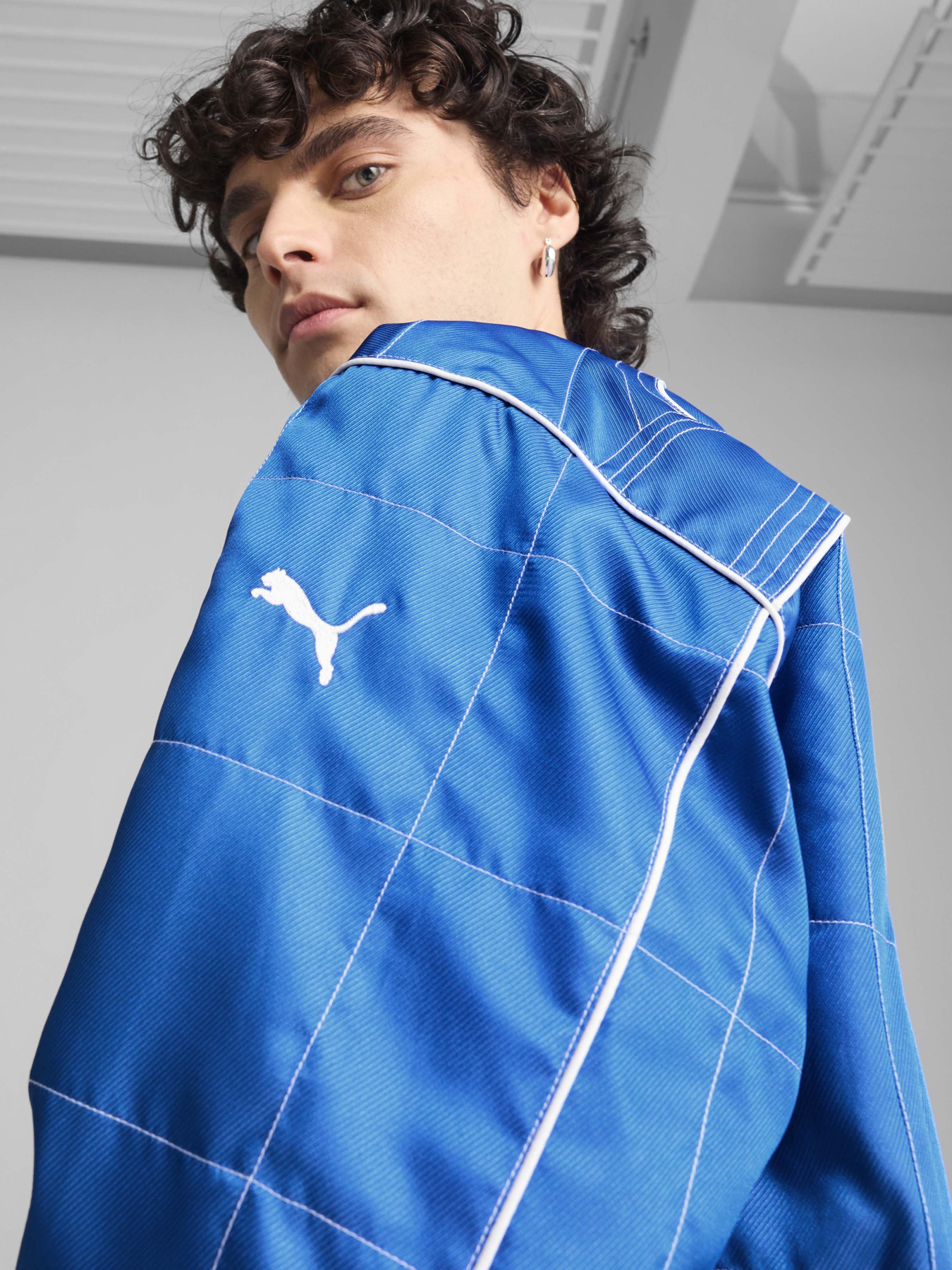 Куртки и дубленки PUMA ARCHIVE SEASONAL RELAXED RACER модель 62991458 Фото