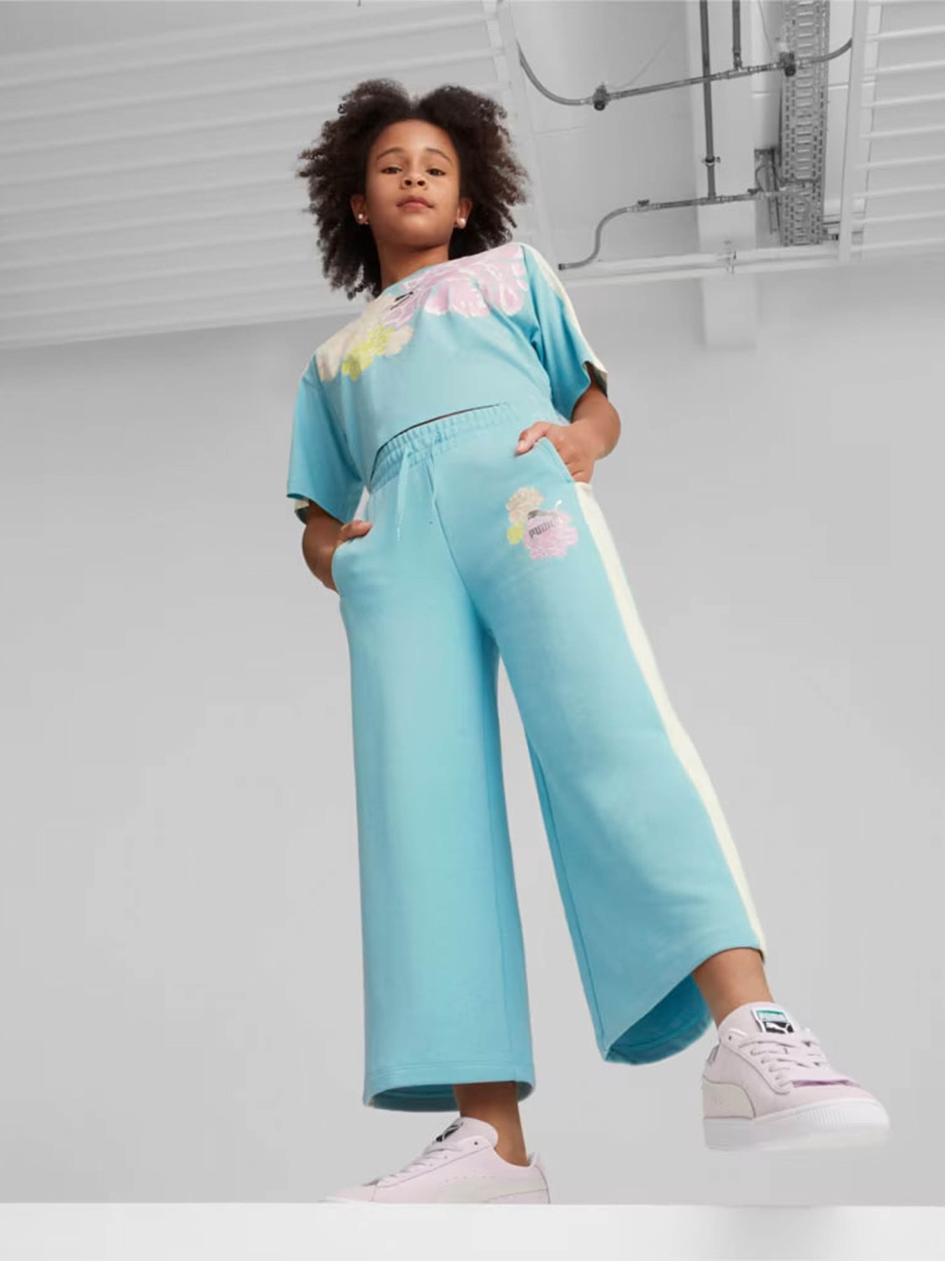 Брюки PUMA T7 SNFLR 7/8 модель 62444422 Брюки PUMA T7 SNFLR 7/8 модель 62444422 Фото