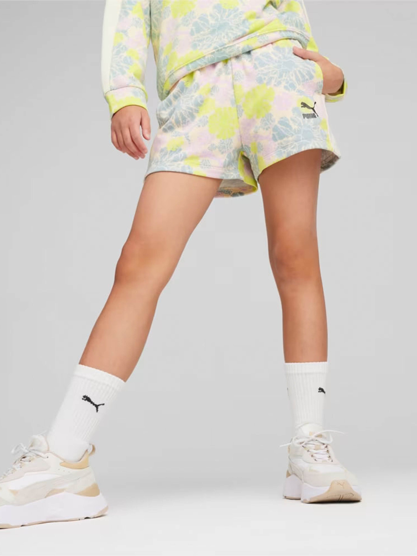 Шорты PUMA T7 SNFLR 7/8 модель 62506287 Шорты PUMA T7 SNFLR 7/8 модель 62506287 Фото