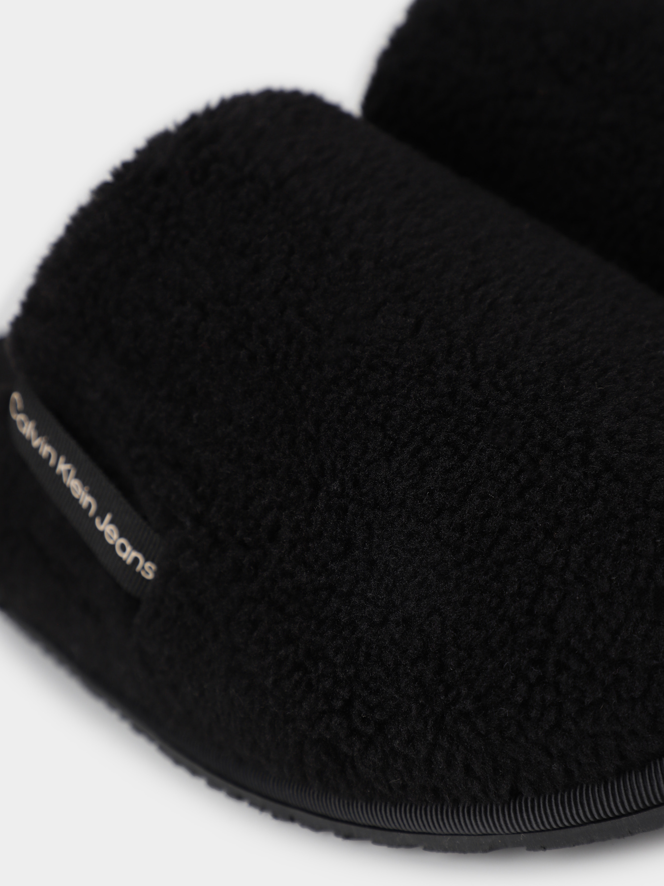 Тапки Calvin Klein Faux Shearling Slippers модель YW0YW01148-0GX Тапки Calvin Klein Faux Shearling Slippers модель YW0YW01148-0GX Фото