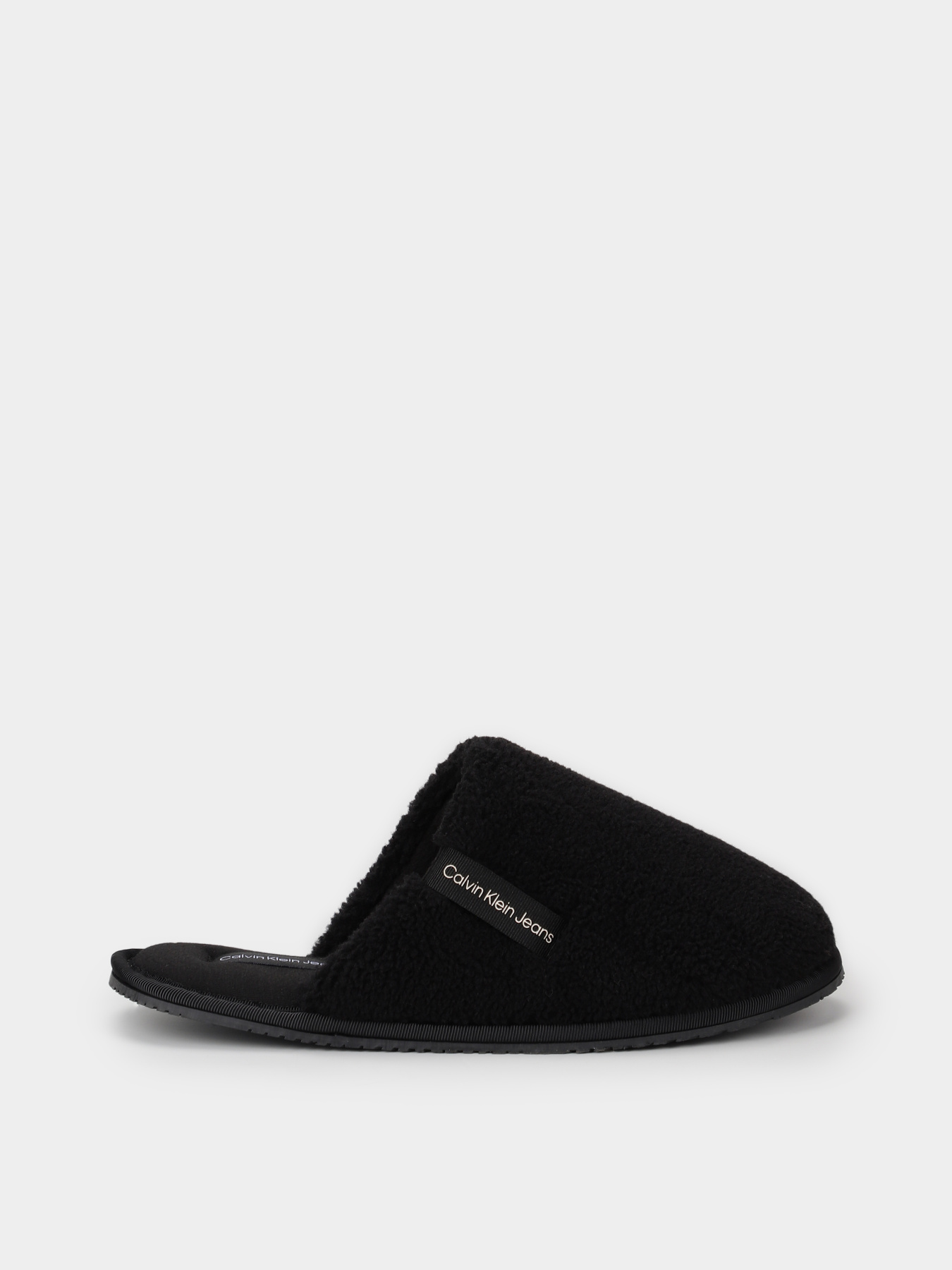Тапки Calvin Klein Faux Shearling Slippers модель YW0YW01148-0GX Тапки Calvin Klein Faux Shearling Slippers модель YW0YW01148-0GX Фото