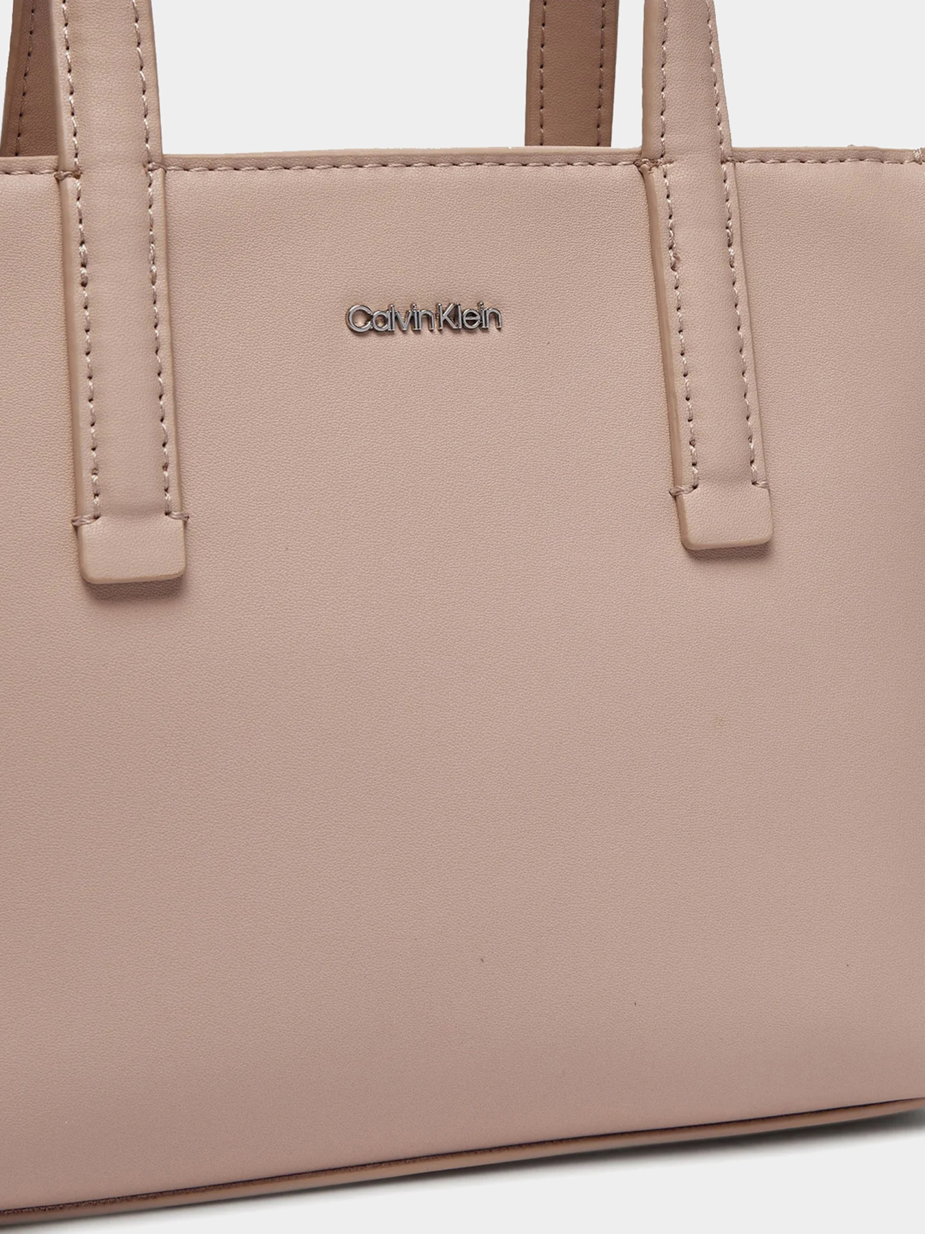 Сумки Calvin Klein Must Mini Tote модель K60K612170-PE1 Сумки Calvin Klein Must Mini Tote модель K60K612170-PE1 Фото