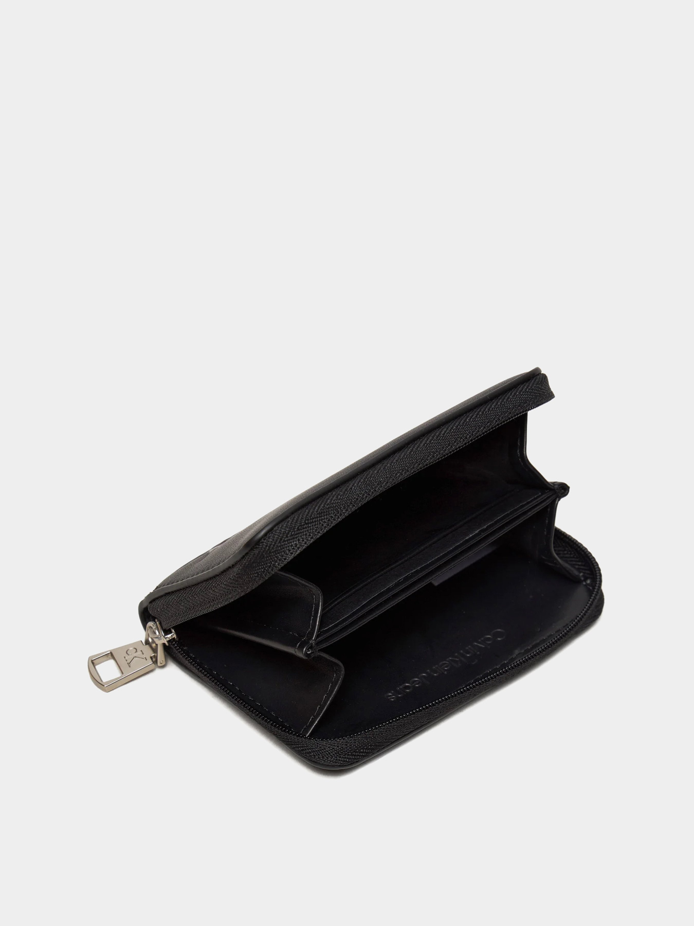 Гаманці Calvin Klein Block Med Zip Around модель K60K612254-BEH Гаманці Calvin Klein Block Med Zip Around модель K60K612254-BEH Фото