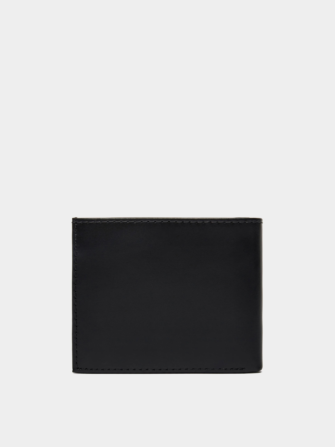 Гаманці Calvin Klein Smooth Bifold модель K50K512076-BEH Фото