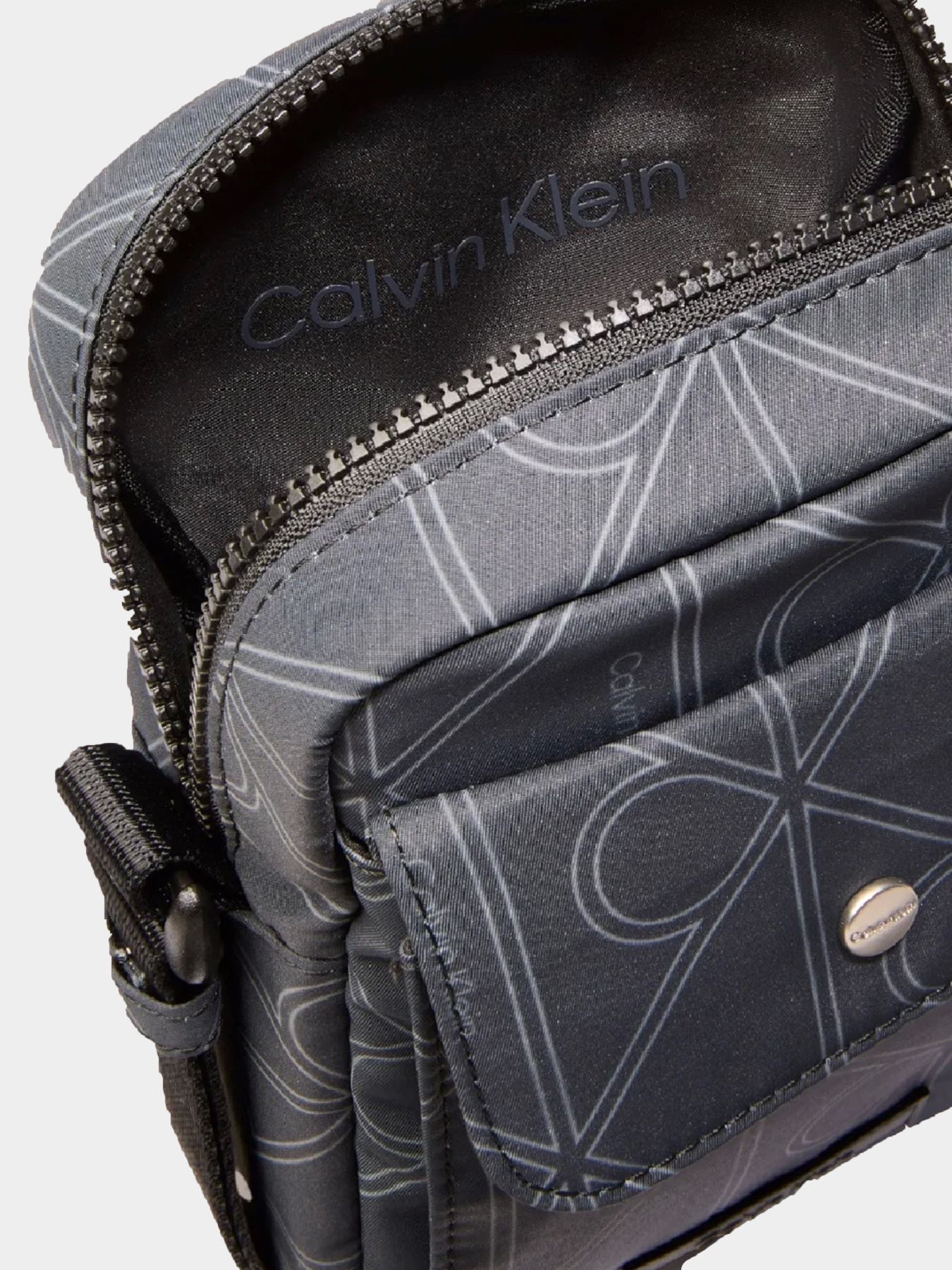 Сумки Calvin Klein PRINTED EMBLEM AOP NYLON SLIM модель LV04D3230G-8MN Фото