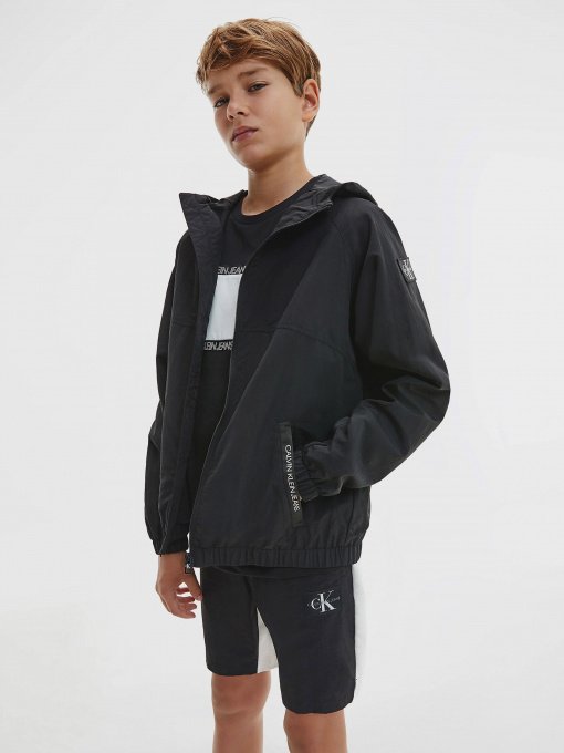 Куртки та дублянки Calvin Klein Monogram Badge модель IB0IB00856-BEH Фото