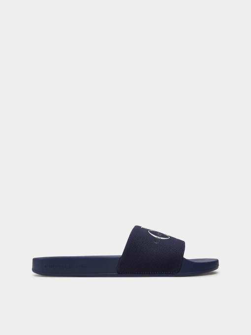 Шльопанці Calvin Klein Slide Monogram Co модель YM0YM00061-0G2 Фото