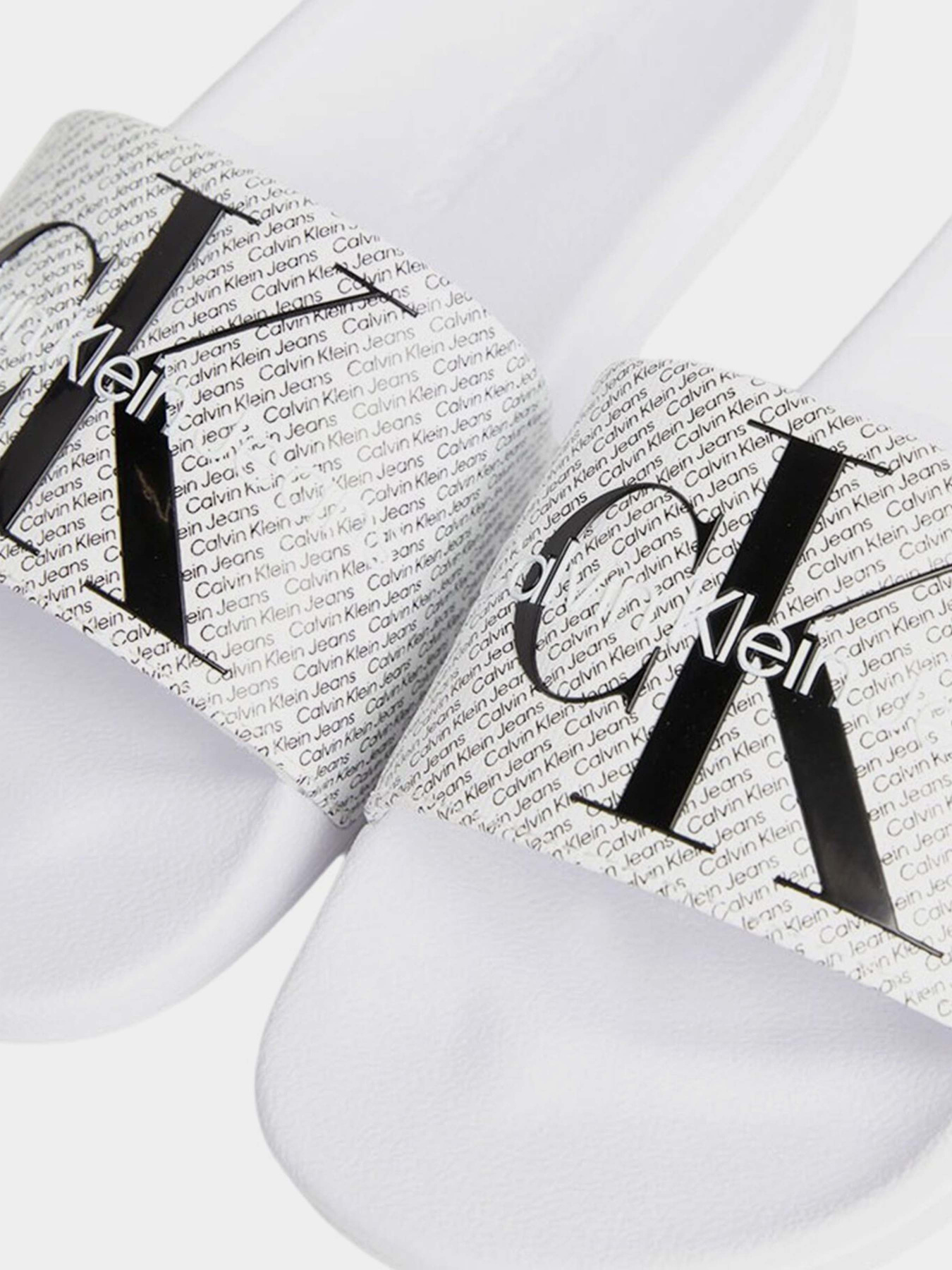 Шльопанці Calvin Klein Slide Aop модель YM0YM00955-01W Фото