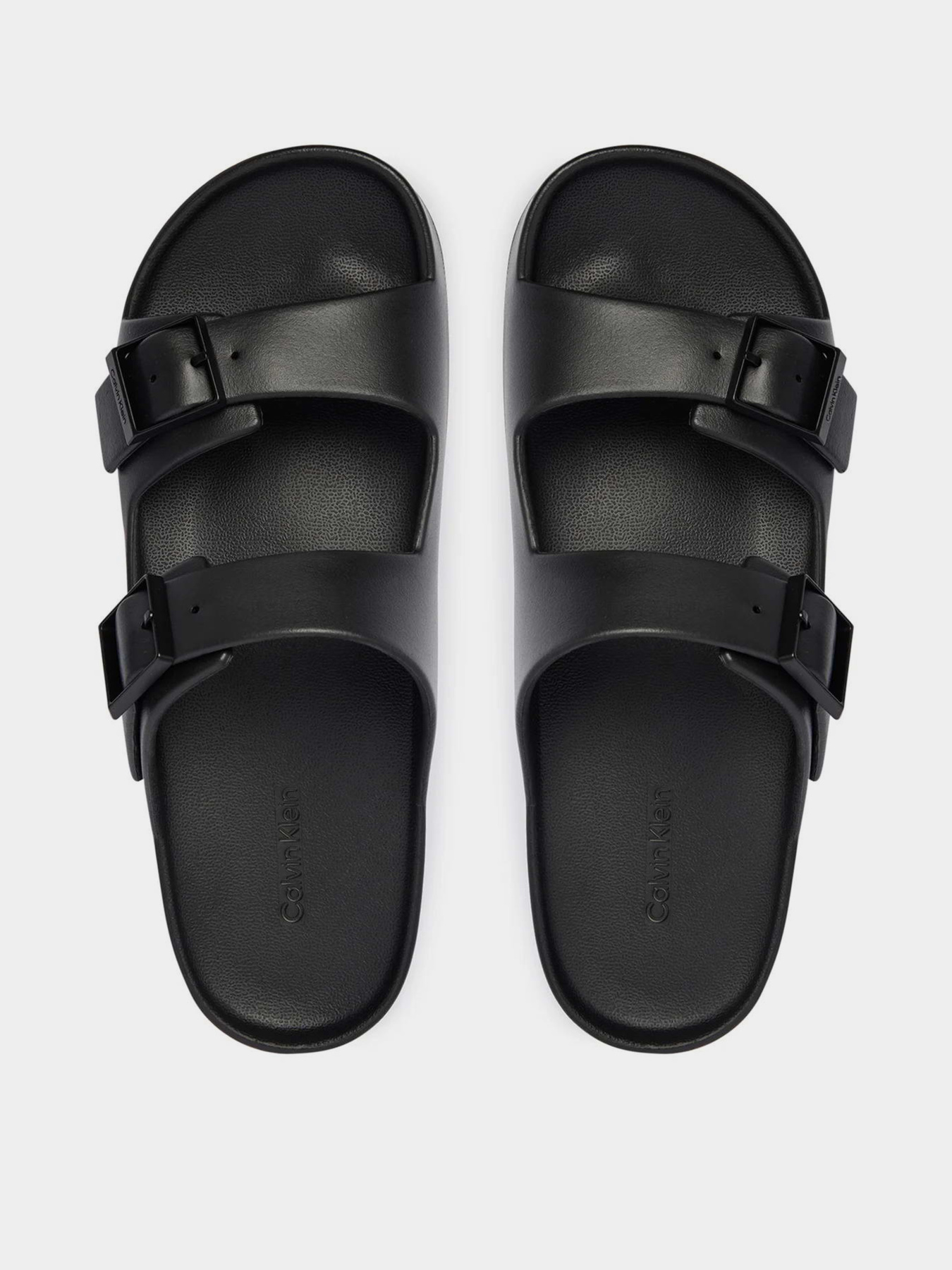 Шльопанці Calvin Klein ERGON EVA DOUBLE BAR SANDAL модель HM0HM02116-0GJ Шльопанці Calvin Klein ERGON EVA DOUBLE BAR SANDAL модель HM0HM02116-0GJ Фото