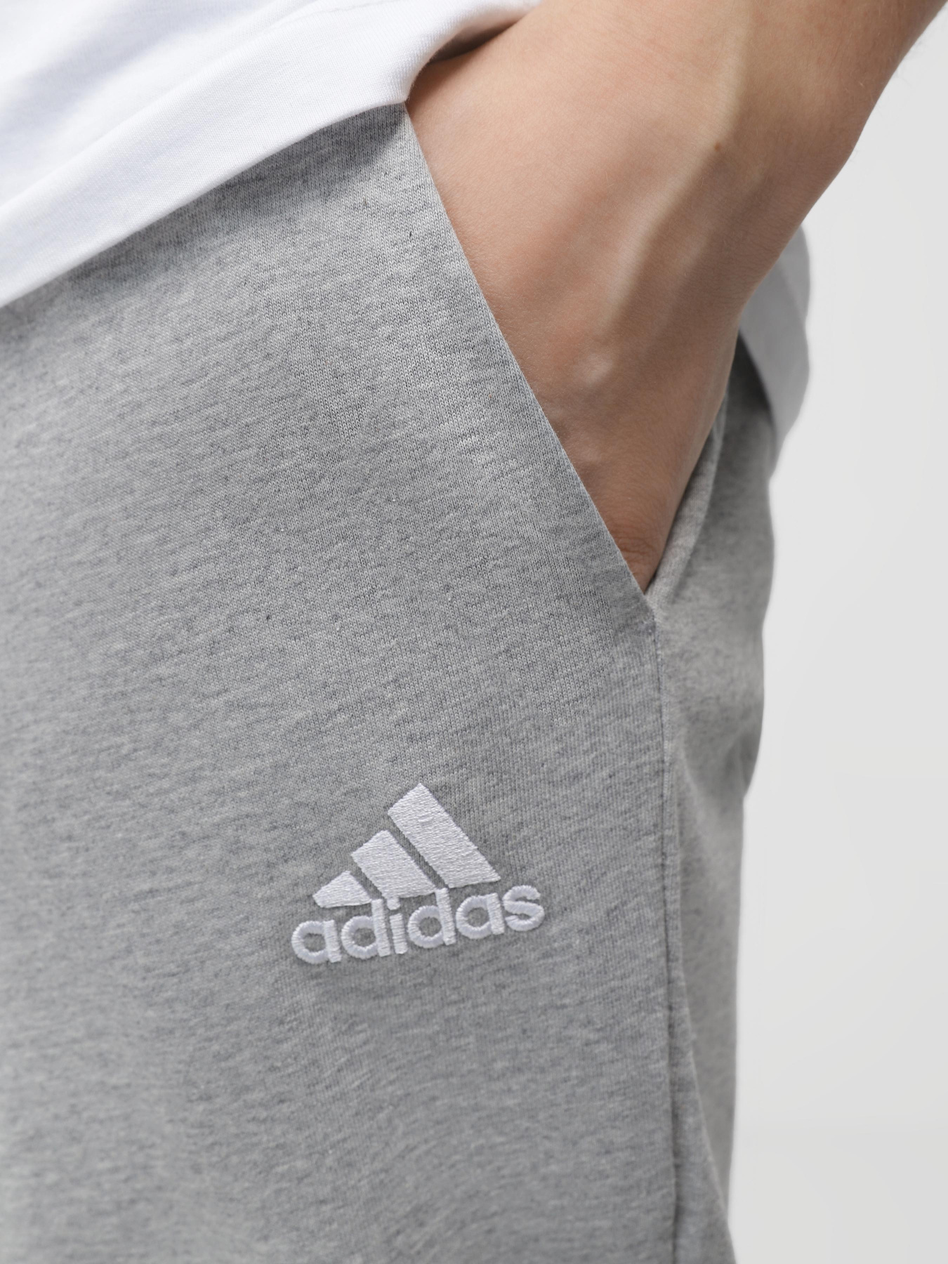 Брюки Adidas ESSENTIALS JERSEY TAPERED модель IC9411 Фото