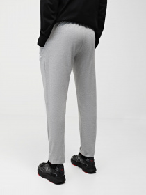 Брюки Adidas ESSENTIALS JERSEY TAPERED модель IC9411 Фото