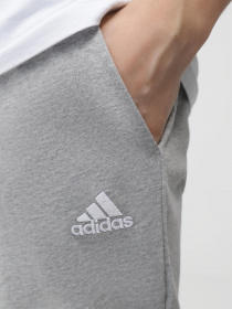 Брюки Adidas ESSENTIALS JERSEY TAPERED модель IC9411 Фото
