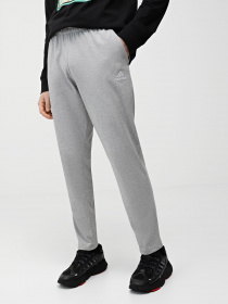 Штани Adidas ESSENTIALS JERSEY TAPERED модель IC9411 Фото