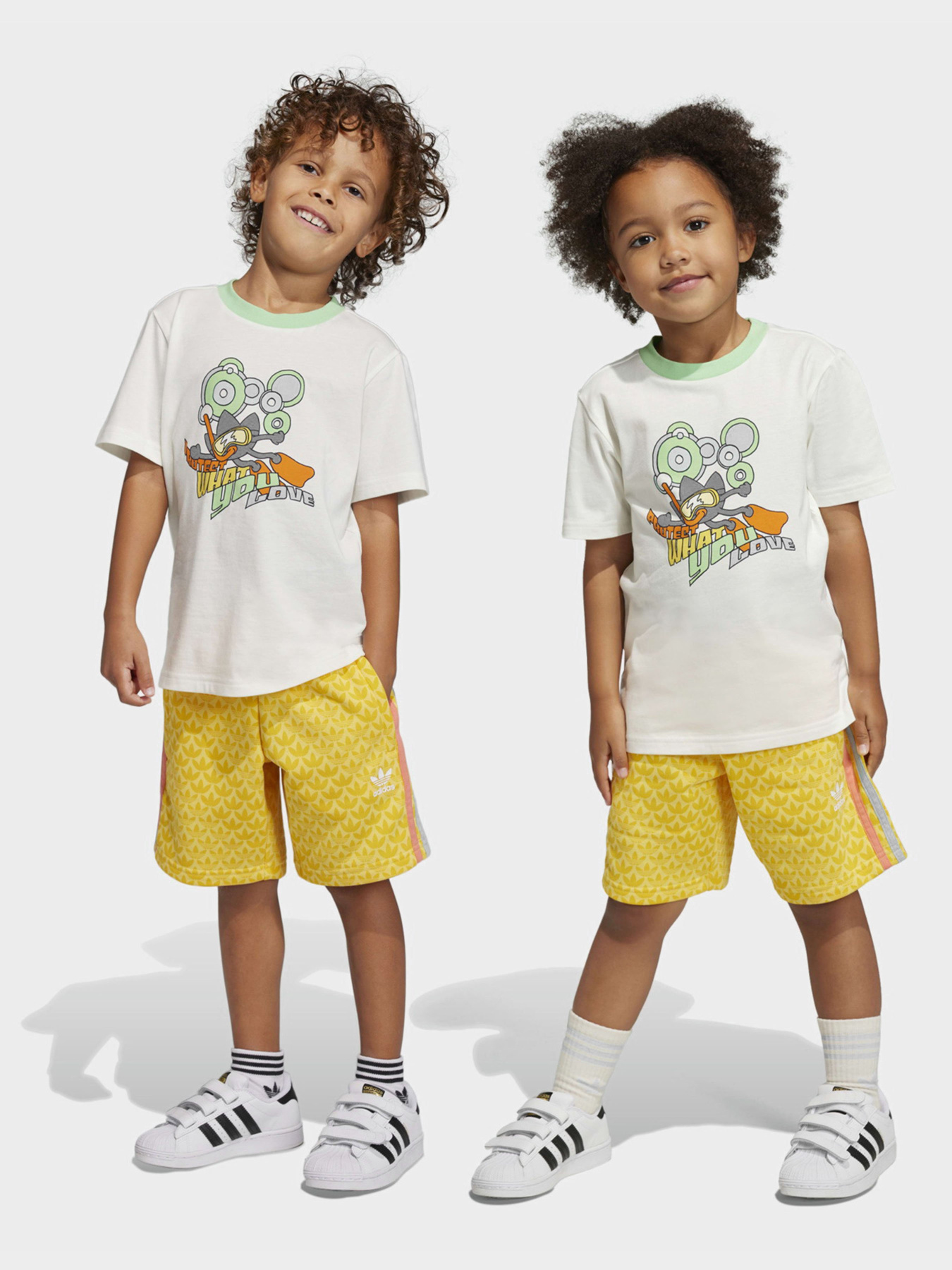Костюмы Adidas GRAPHIC PRINT модель IB8628 Фото