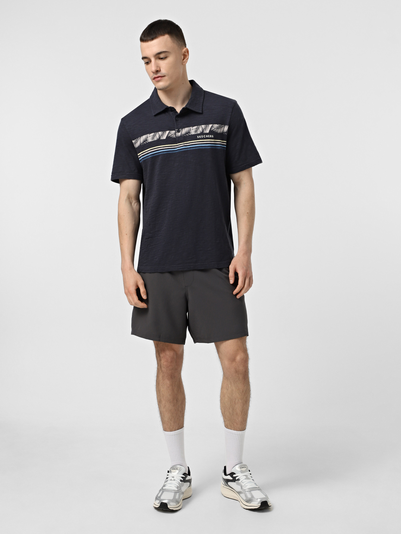 Футболки и поло Skechers TROPICAL BREEZE STRIPE POLO модель TP105 CCNV Футболки и поло Skechers TROPICAL BREEZE STRIPE POLO модель TP105 CCNV Фото