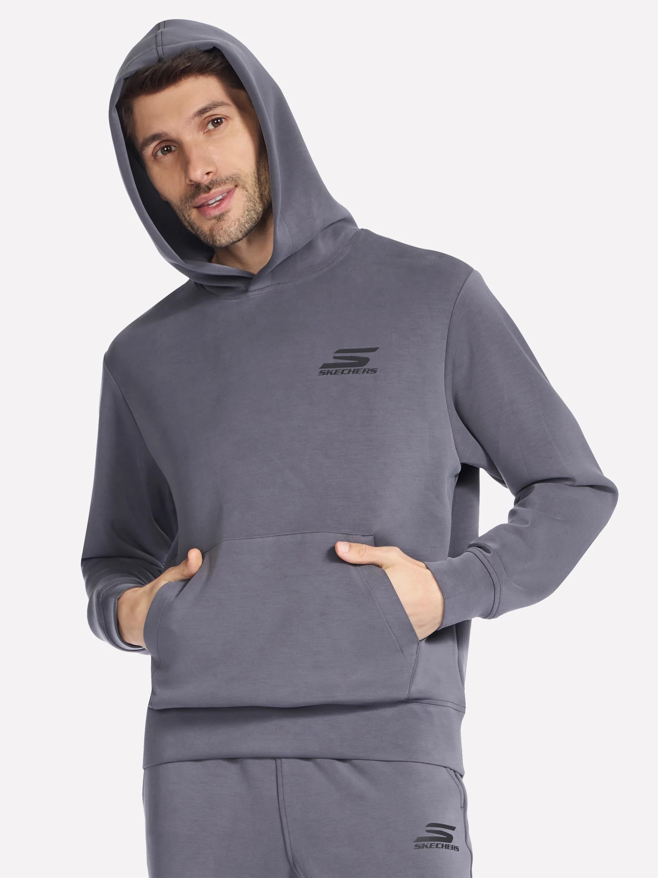 Худи и свитшоты Skechers SKECHCLOUD ELEVATE HOODIE модель HD102 BKCC Фото