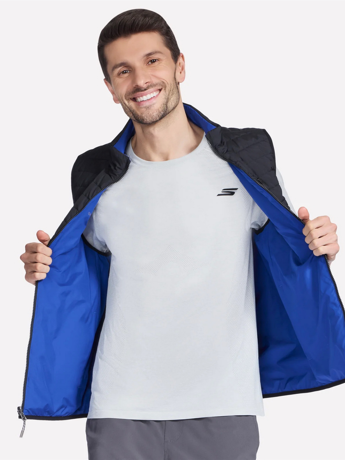 Куртки и дубленки Skechers GOSHIELD ALTITUDE REVERSIBLE V модель JA140 BKRY Фото