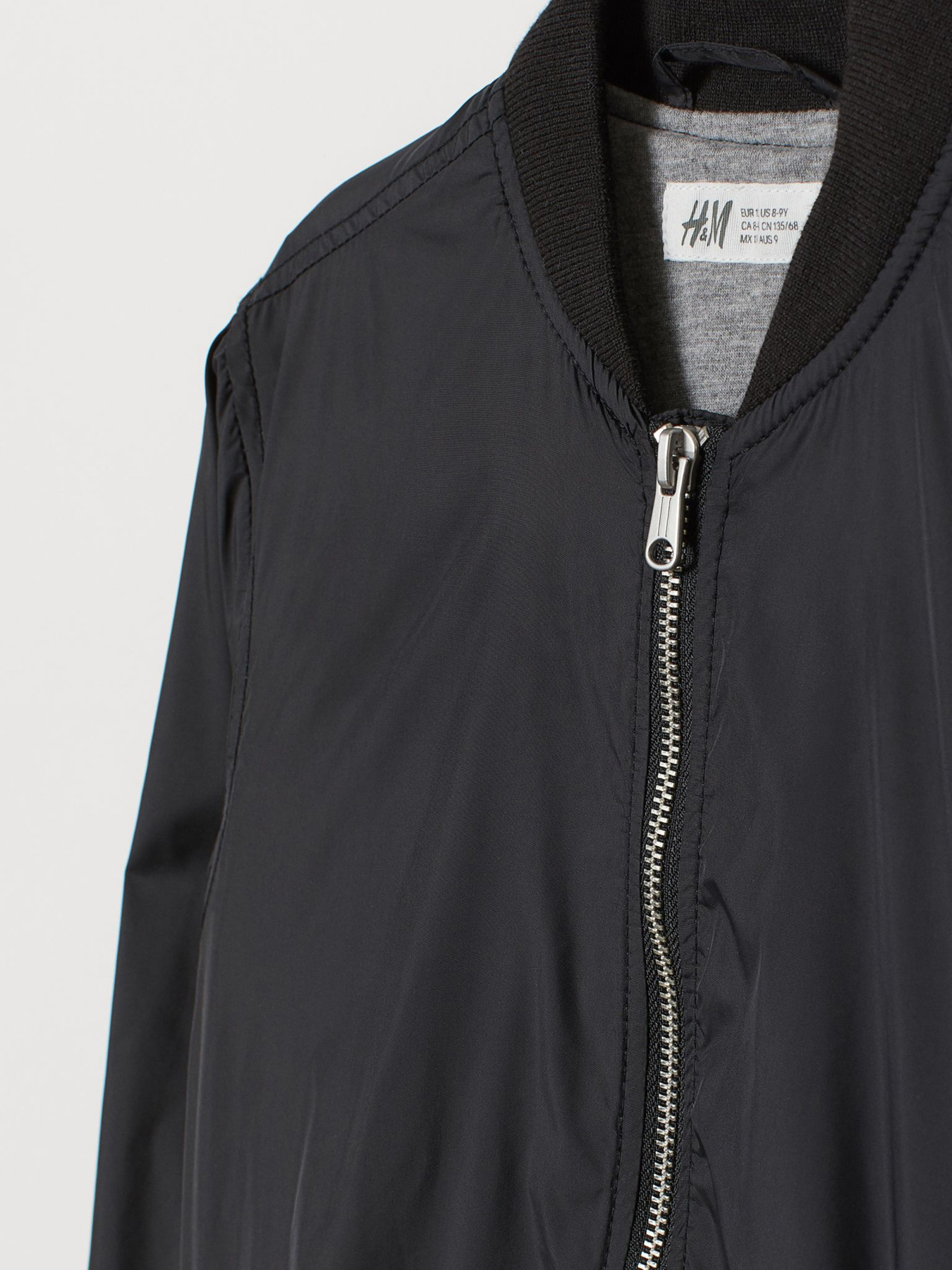 Куртки та дублянки H&M модель 0803565_чорний Фото