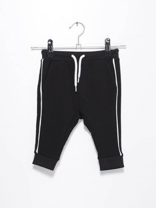 Брюки H&M модель 0743905_чорний з білим Фото