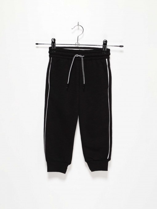 Брюки H&M модель 0754598_чорний з білим Фото
