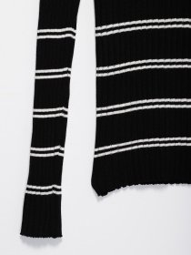 Свитры и кардиганы H&M модель 08020231_чорний з білим Фото