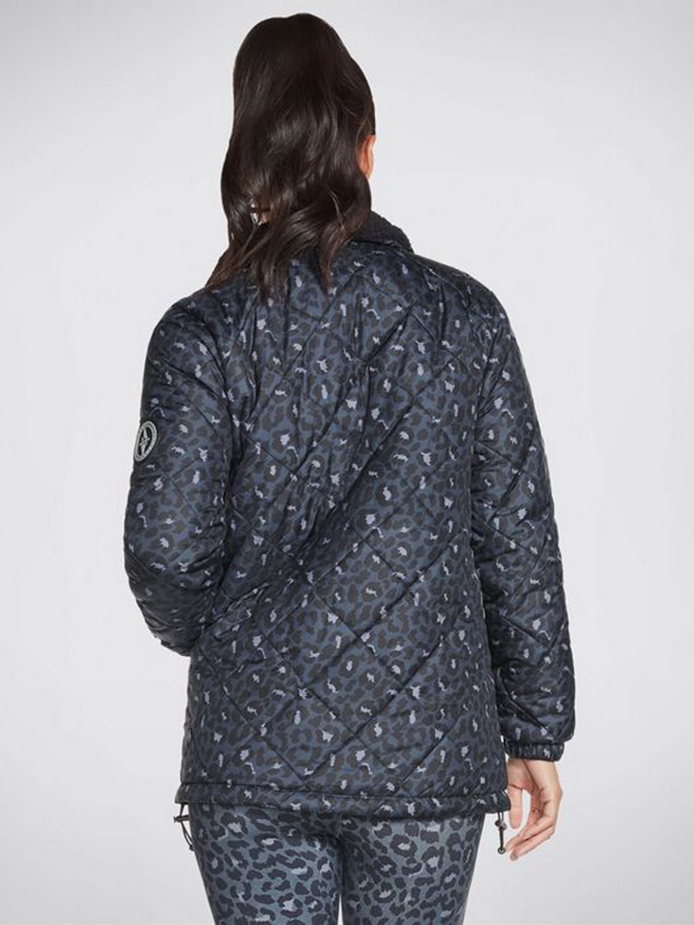 Куртки та дублянки Skechers GOwalk Wear Midnight Puffer Jacket модель W3JA251 BKNV Фото