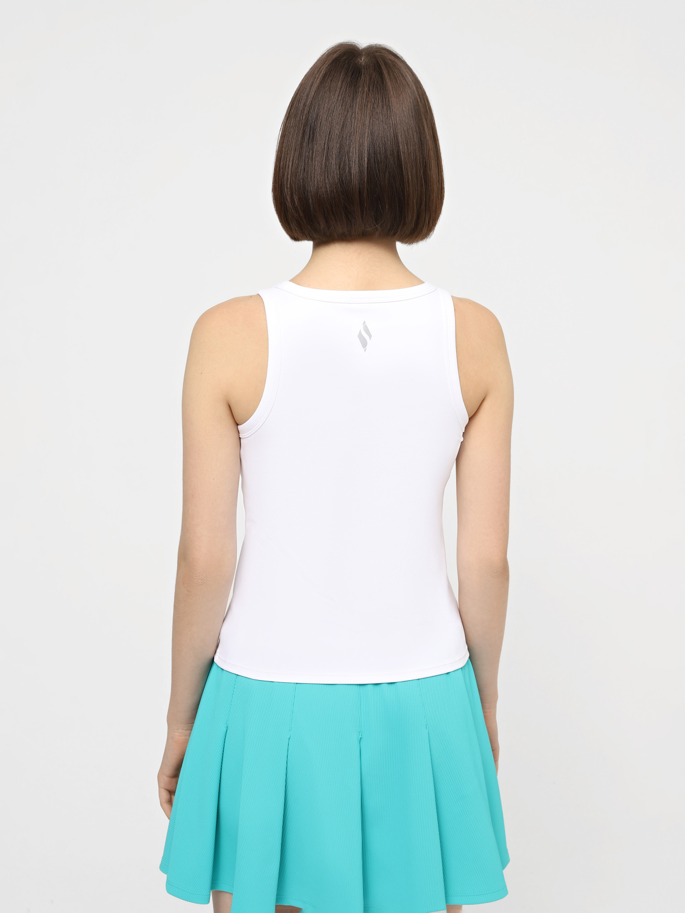 Футболки і поло Skechers GO Walk Shelf Bra Tank модель TT20 WHT Футболки і поло Skechers GO Walk Shelf Bra Tank модель TT20 WHT Фото