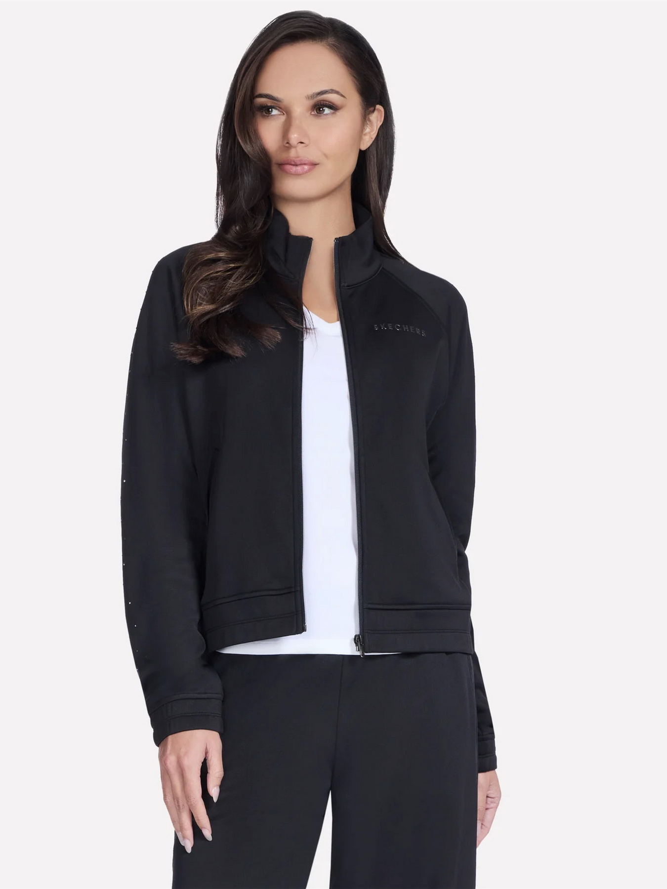 Куртки та дублянки Skechers SKECHTECH SHINE TRACK JACKET модель JA290 BLK Куртки та дублянки Skechers SKECHTECH SHINE TRACK JACKET модель JA290 BLK Фото