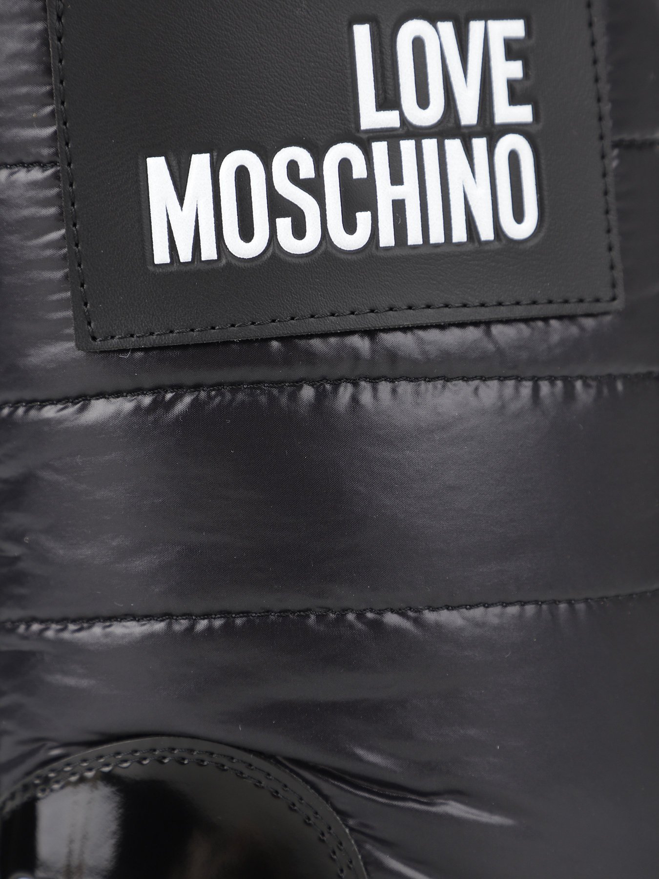 Ботинки и сапоги Love Moschino модель 1211204_чорний з білим Фото