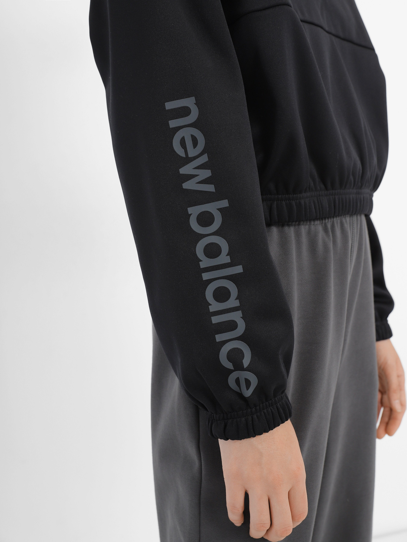 Худі та світшоти New Balance Performance модель WT33187BK Худі та світшоти New Balance Performance модель WT33187BK Фото