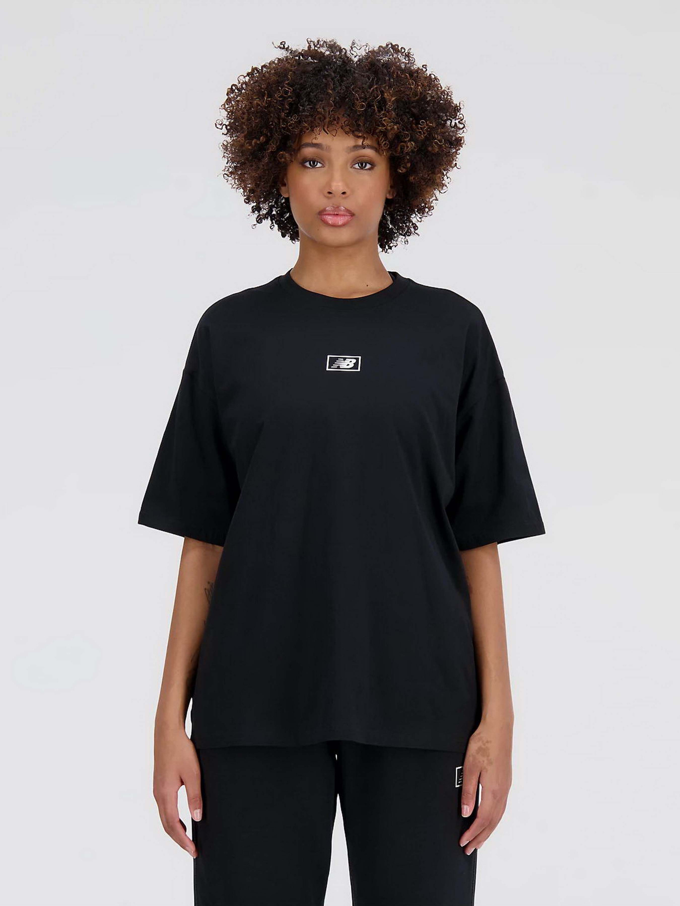 Футболки и поло New Balance Essentials Graphic модель WT33525BK Футболки и поло New Balance Essentials Graphic модель WT33525BK Фото