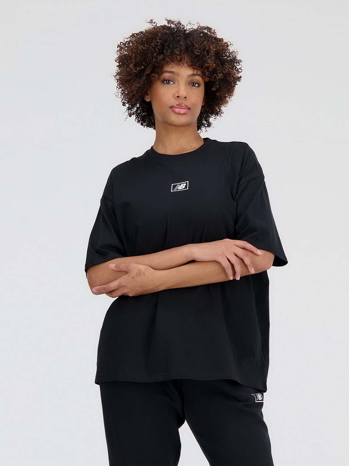 Футболки и поло New Balance Essentials Graphic модель WT33525BK Футболки и поло New Balance Essentials Graphic модель WT33525BK Фото