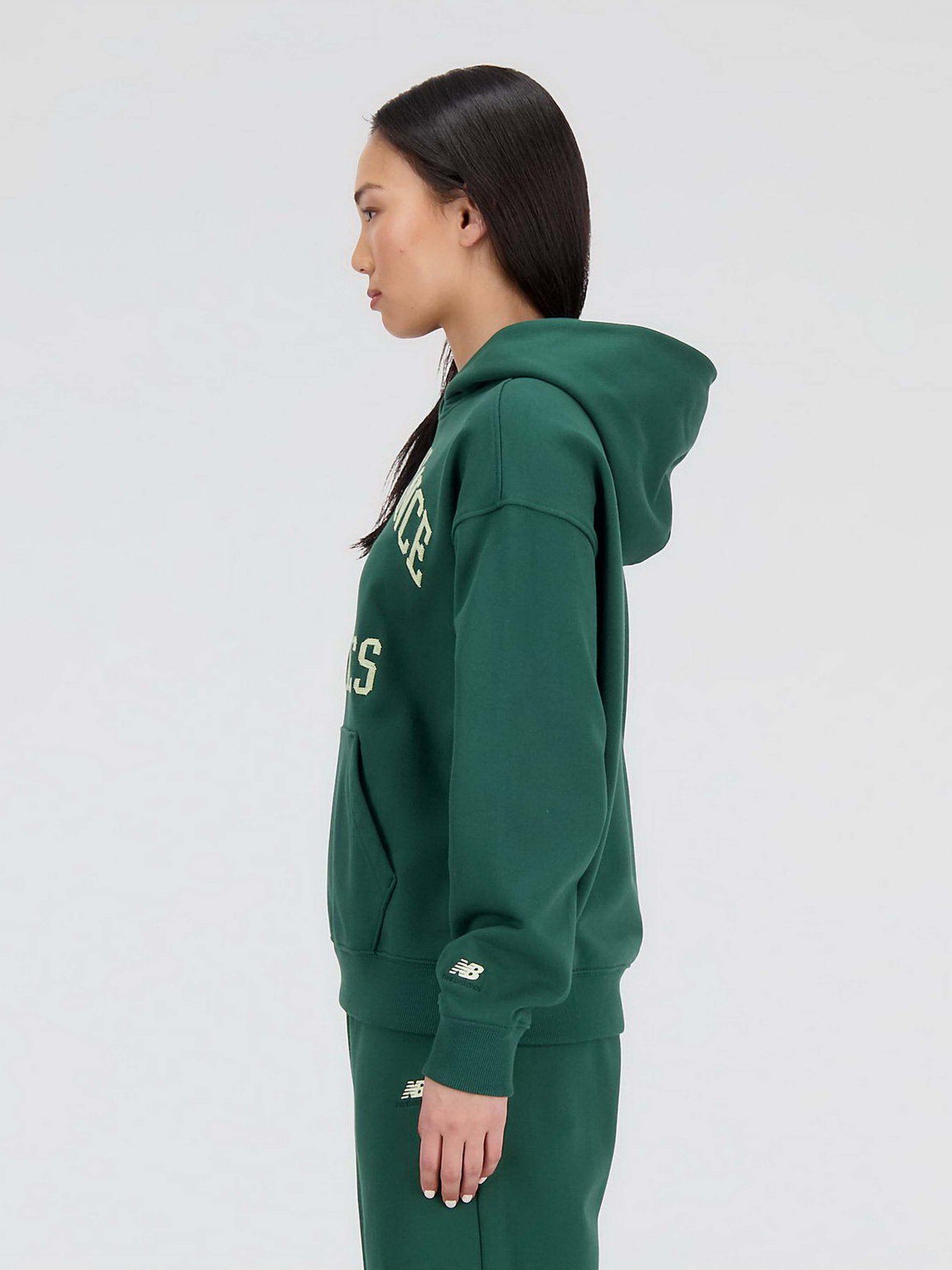 Худі та світшоти New Balance Athletics Varsity модель WT33550NWG Фото