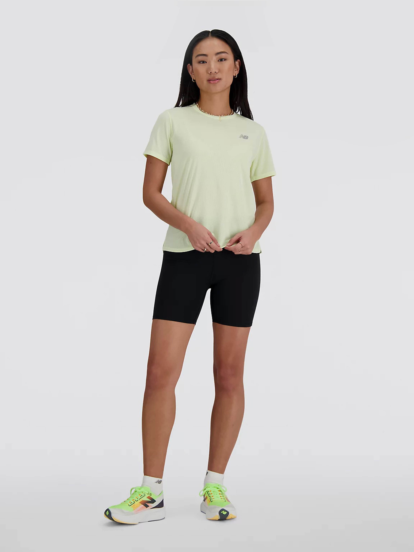 Футболки і поло New Balance PERFORMANCE модель WT41253LH3 Футболки і поло New Balance PERFORMANCE модель WT41253LH3 Фото